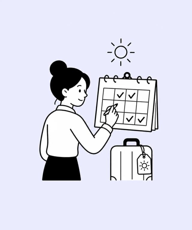 A person plans time off on a calendar beside a suitcase.